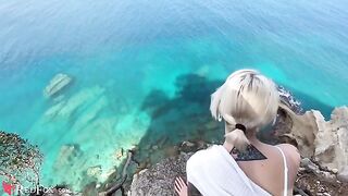 The cute girlfriend passionately sucks her ex-boyfriend's big dick on the shore