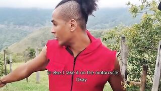 Mariana repairs her car on the street with her sexy body