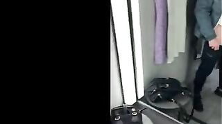 A girl gets fucked in the fitting room, covered in cum