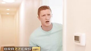 The stepson helps Mellanie Monroe when she gets stuck while setting up the laundry rack