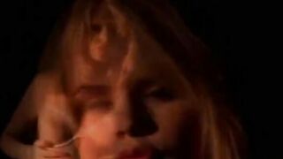 The girl with the beautiful body plays in shadows and showcases her skills