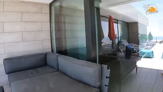 A blonde girl with socks in a swimming pool has sex with her boyfriend