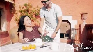 A busty brunette enjoys a passionate holiday with a well-endowed man