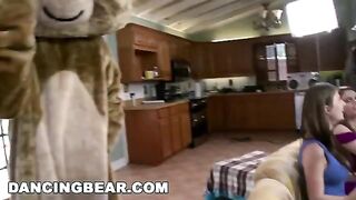 A group of girls is having a wild party with some guys, featuring the stunning Ava Addams with her jaw-dropping triple D boobs and captivating dark eyes that can pull you into a mysterious and intense world of passion