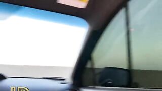 Slutty chick wanking cock in the car parking lot