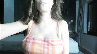 A girl with a beautiful figure shows her pregnancy progress through webcam chat