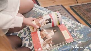 Lesbian beauties study Kama Sutra before enjoying intimate pleasures together