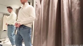 A hot chick is fucking in the fitting room and almost gets caught!