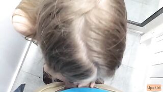 Public blowjob in a shop changing room with a petite girl