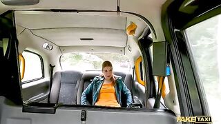A big redhead chick squirts cock juices in the taxi cab