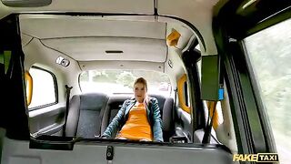 A big redhead chick squirts cock juices in the taxi cab