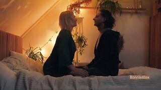 A couple engages in slow, deep, passionate lovemaking at home