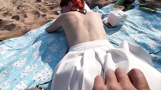 A couple has sex on the beach and gets caught for making love in public
