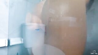 A cock sucker is licking the pussy of her stepsister in the shower