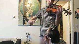The guy tried to practice violin but was interrupted by his passionate girlfriend