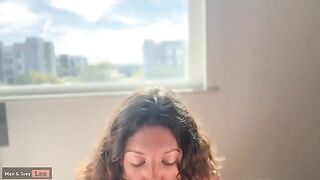 A cute woman has sex with her husband in front of passers-by