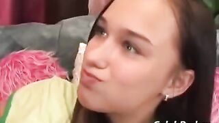 Cute slender girl has sex with an adult on the couch