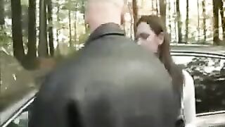A girl was put on the hood of a car and started to tear her