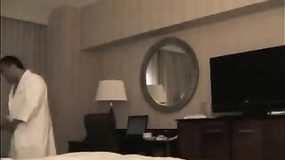 A man checks into a hotel and undresses a whore