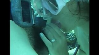 A man has sex with a hairy girl under the water in this hot vid