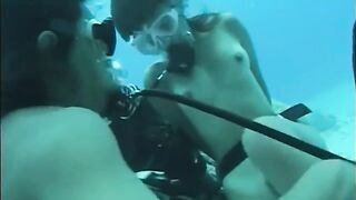A man has sex with a hairy girl under the water in this hot vid