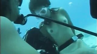 A man has sex with a hairy girl under the water in this hot vid