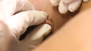 A girl with a big clitoris plays with her new sex toy