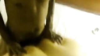 Fat woman fucked by two guys on her back on the bed