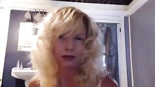 A hot brunette aged over 50 has sex in the bathroom with a vibrator