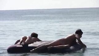 A girl showed her naked body on the beach to attract attention