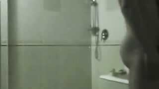 A drunk brunette has sex with her friend in the bath