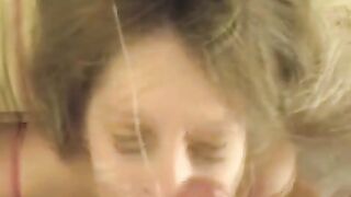 A cumshot on the face of a blonde after an excellent blowjob performance