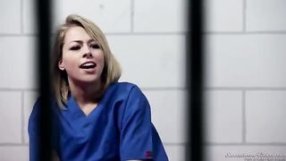 Two hot chicks are licking each other in a prison cell