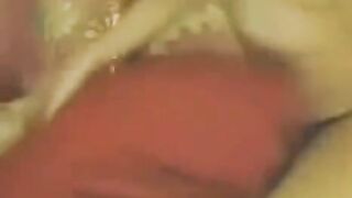 A Chinese girl caresses herself in front of a webcam, showcasing her stunning allure