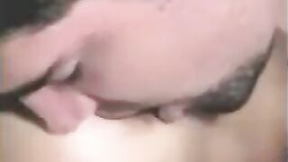 A guy was fucked by a strap-on with his cock in his hand