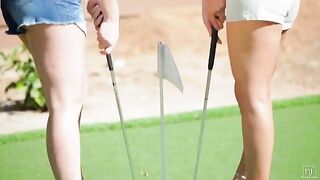 A beautiful woman is lost in lesbian sex at golf