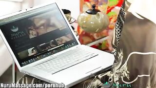 Hot massage with an Asian girl whose boobs are covered in oil