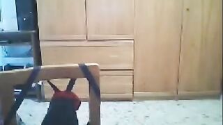 A girl fucks in front of a webcam while her husband watches
