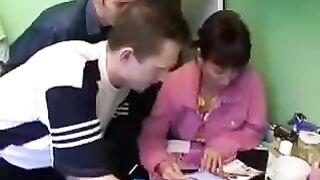 A sexy Russian mother gets fucked by four guys at the same time