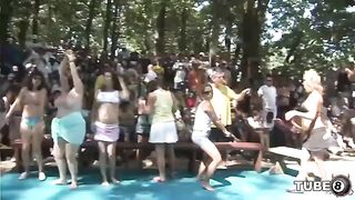 A young girl is having fun with someone in the forest