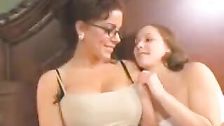 A sweet mom is having fun with her young daughter