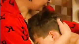A hot woman in glasses gets a cumshot on her face
