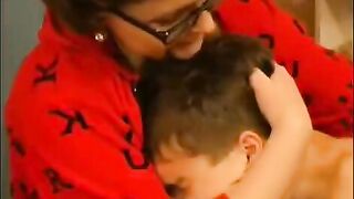 A hot woman in glasses gets a cumshot on her face