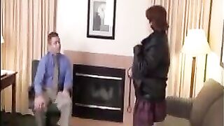 A fat woman fucks her boss on the couch in pantyhose and stockings