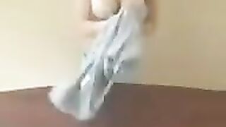 A chick with big milk is showing the master class of how to do it