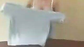 A chick with big milk is showing the master class of how to do it
