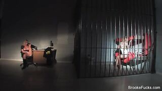 The guard caresses herself with her hands in uniform