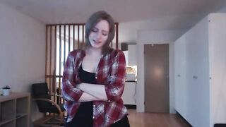 The cutie babe caresses her wet pussy with a big dildo