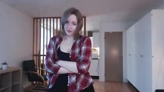 The cutie babe caresses her wet pussy with a big dildo