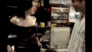 Quick sex with a saleswoman behind the counter, using a dildo